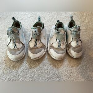 Two pair of Nike Shoes